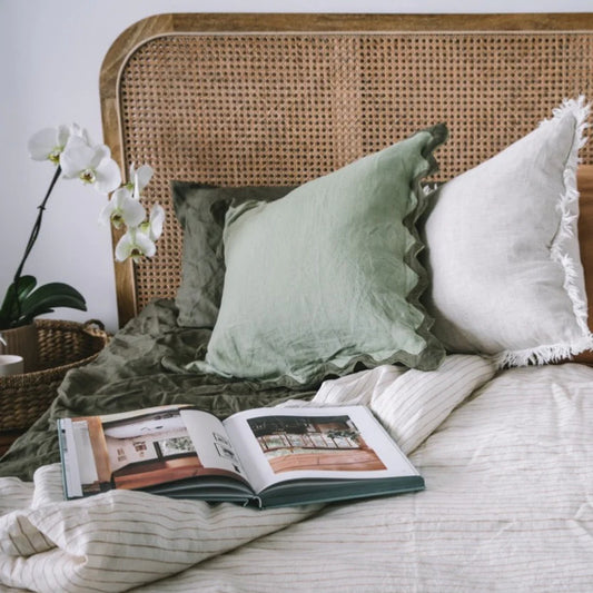 Luxurious European flax linen sheets styled with flax linen cushions